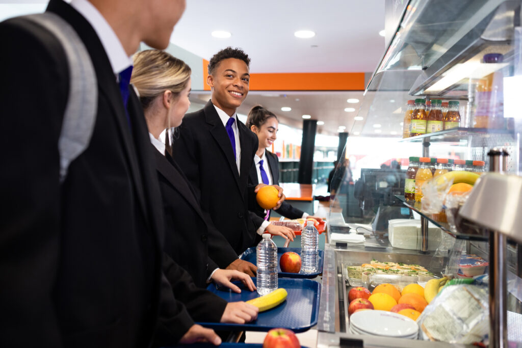 Students selecting their school lunch in the school canteen