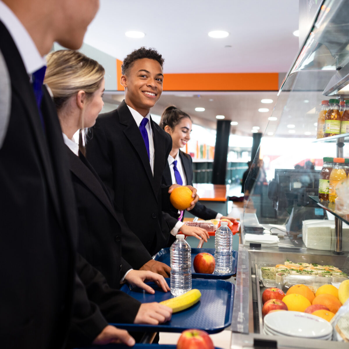 Students selecting their school lunch in the school canteen