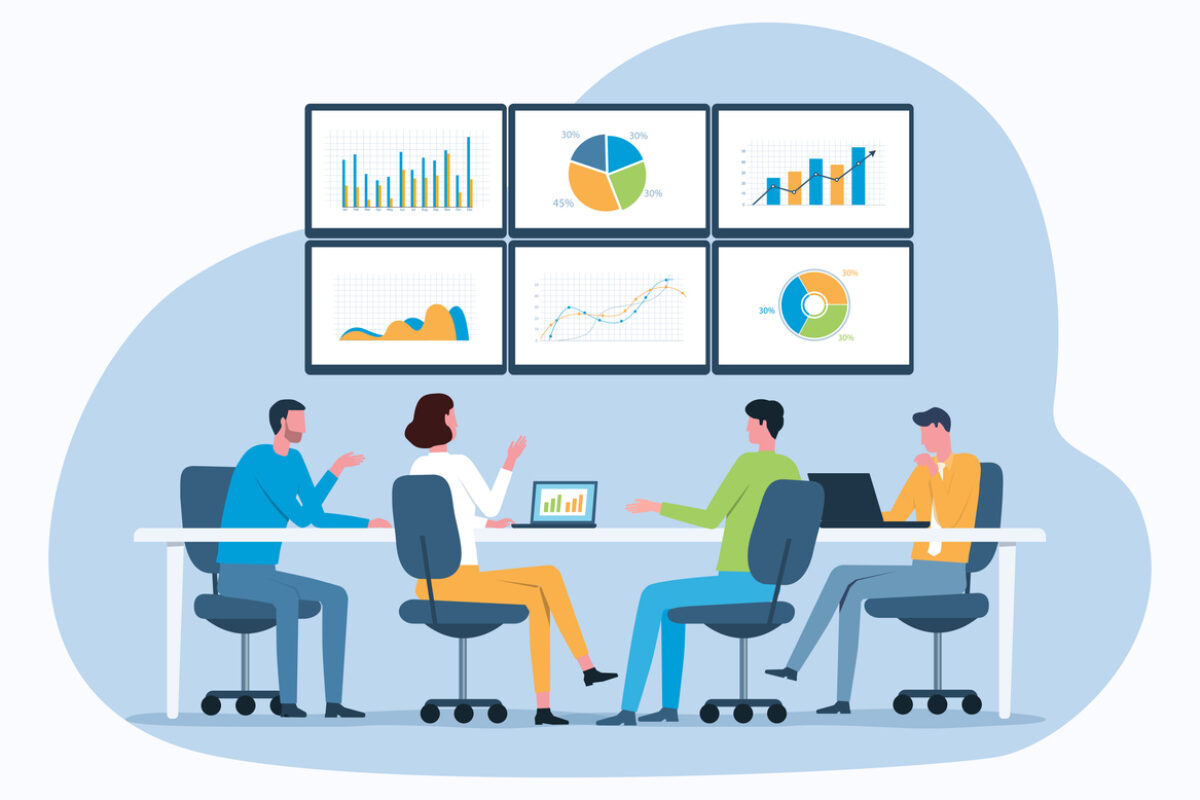 graphic of 4 people sat at a bank of desks looking at 6 screens to analyse chart and benchmarck figures.