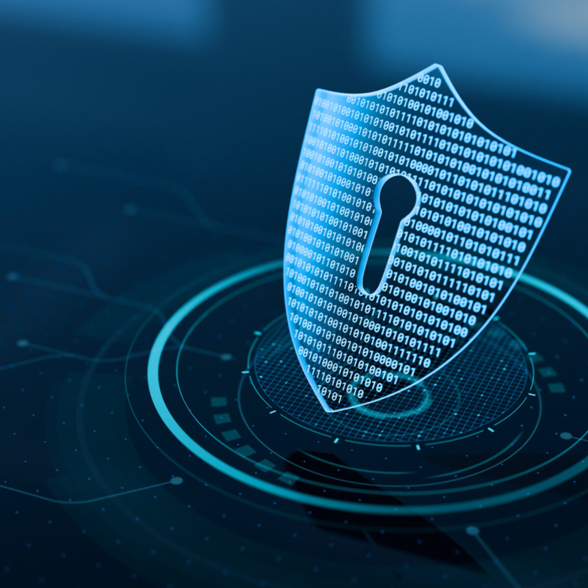 a digital shield to represent a secure digital infrastructure. The shield is blue on a black background